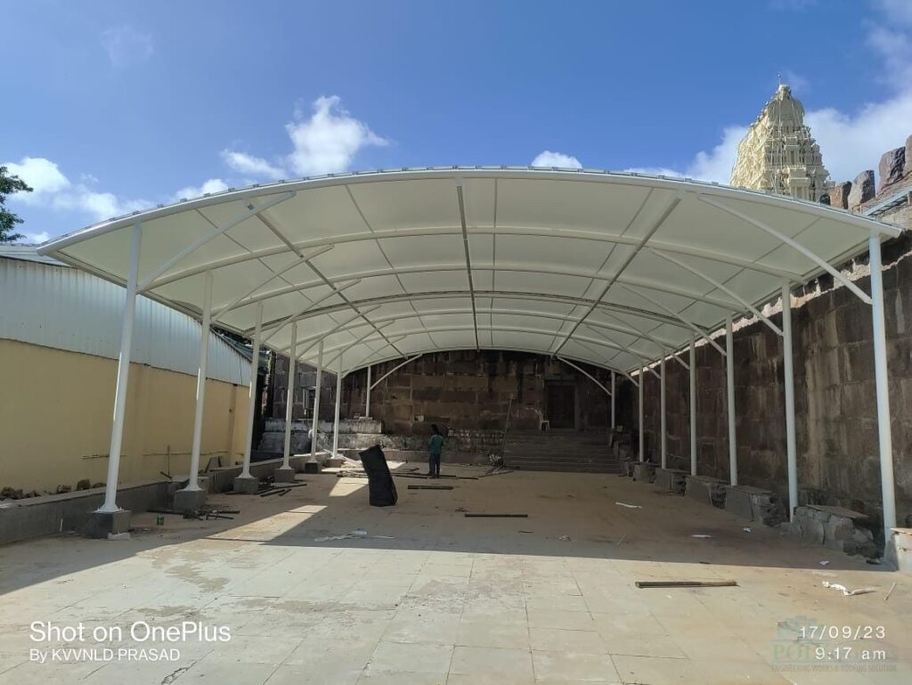 Tensile membrane roofing structure