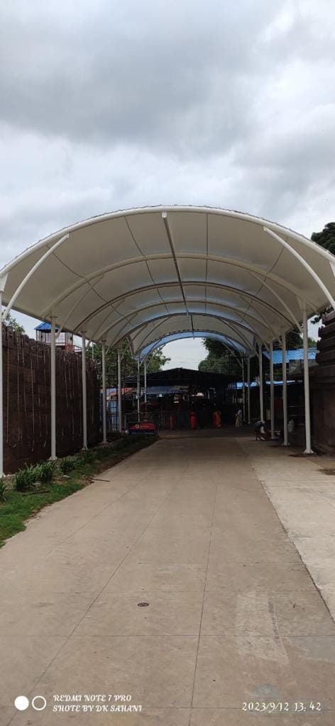 Tensile membrane roofing structure