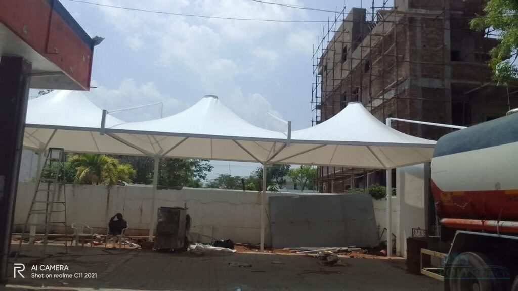 Tensile membrane roofing structure