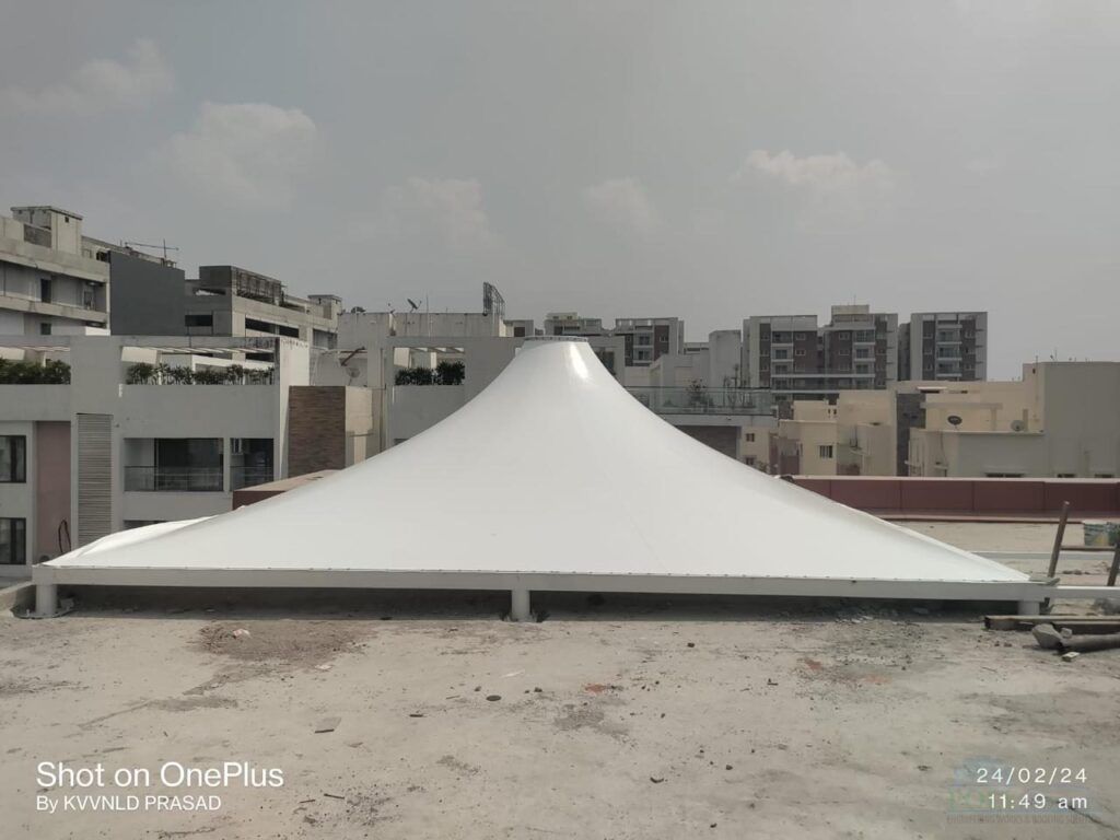 Tensile membrane roofing structure