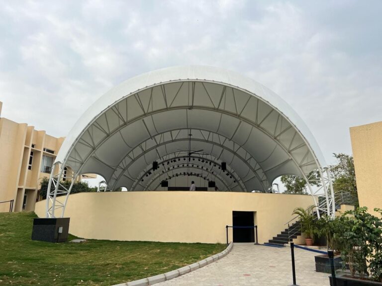 Tensile membrane roofing structure