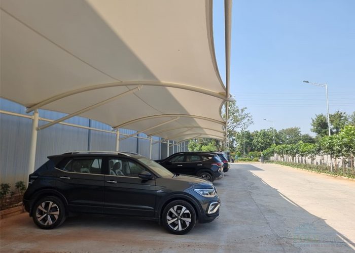 Tensile membrane roofing structure
